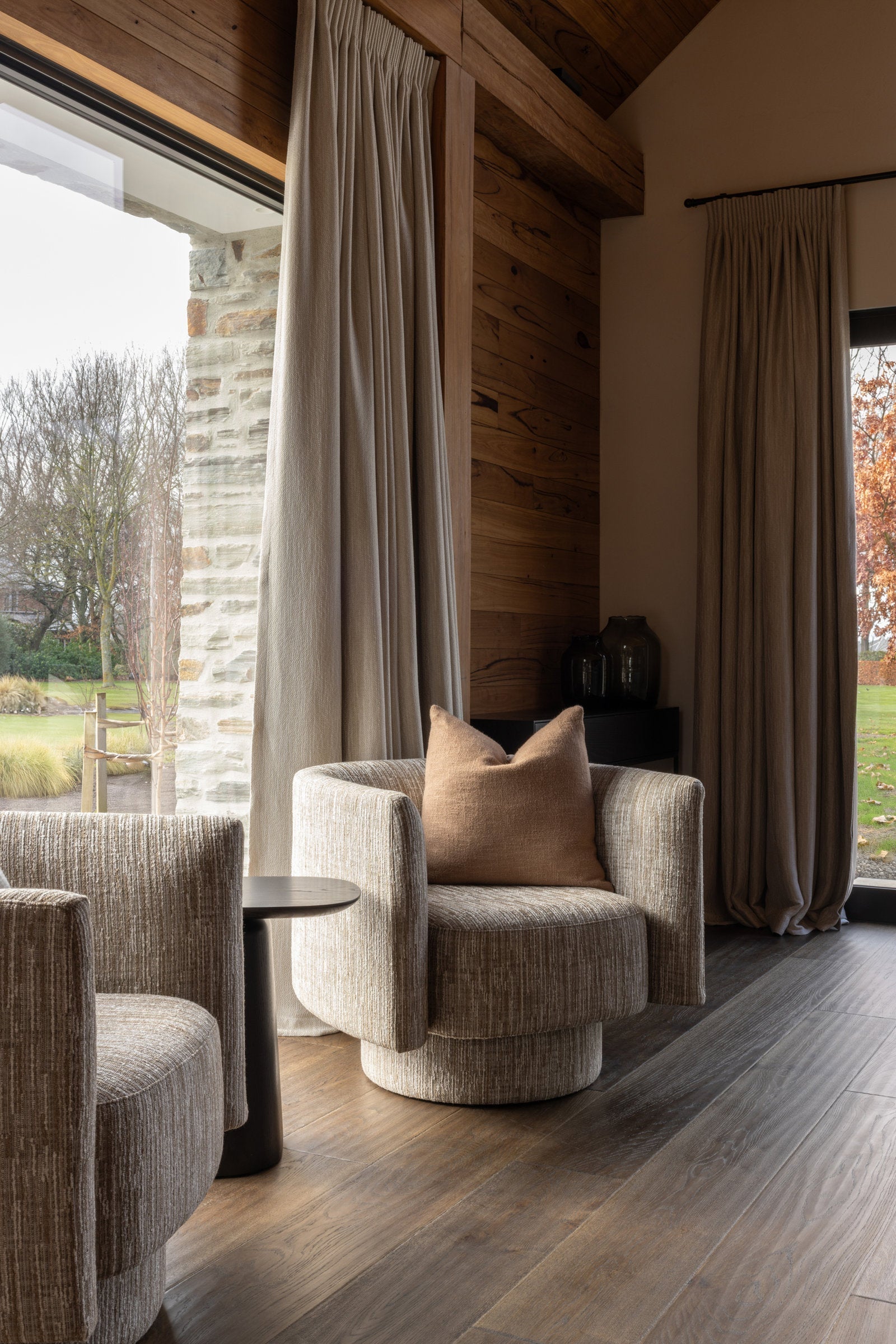 Carters Road, Ashburton — hand-scraped Chocolat Aged Oak flooring against blackened steel, glass and stone
